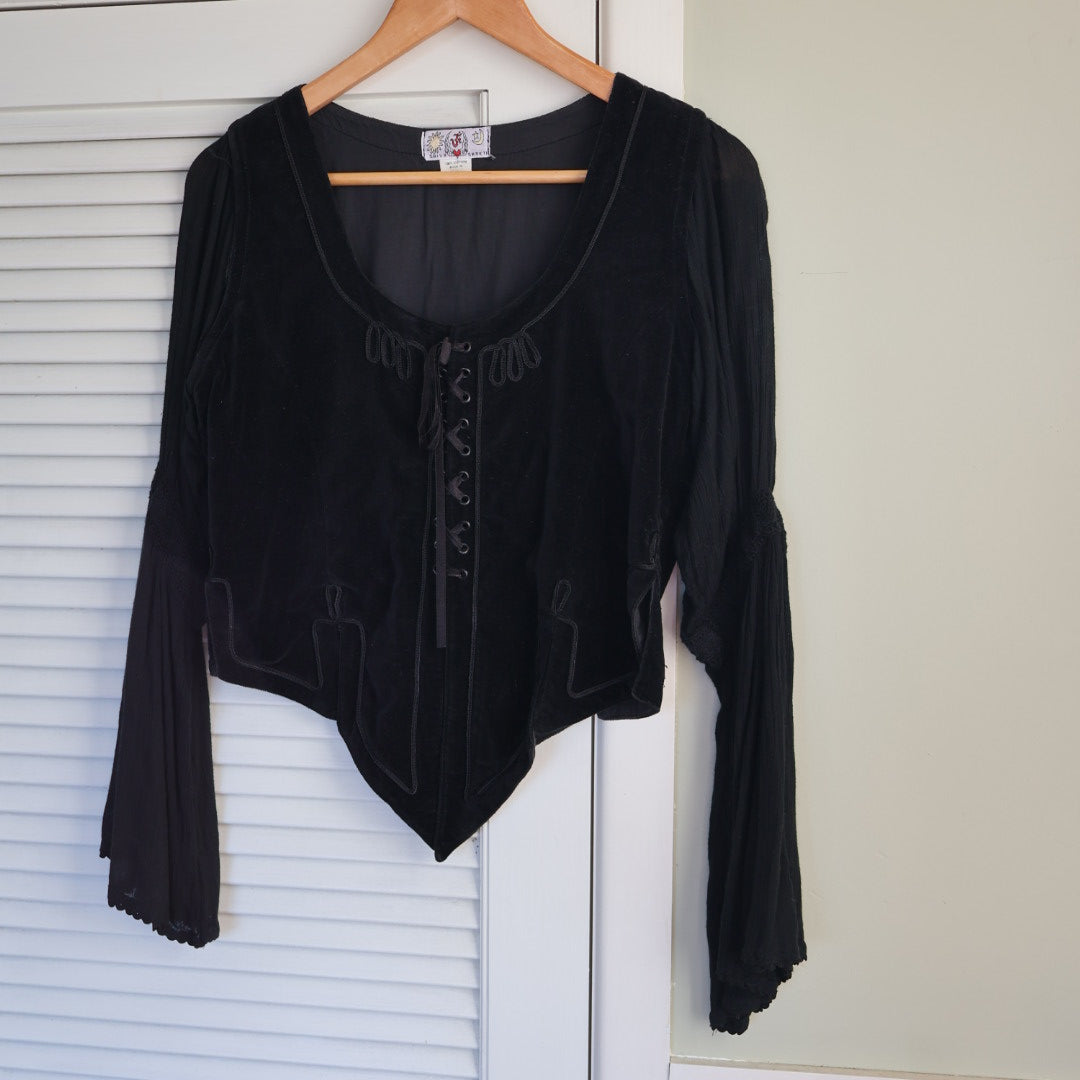 black velvet top braided embroidery and a laced-up bodice.