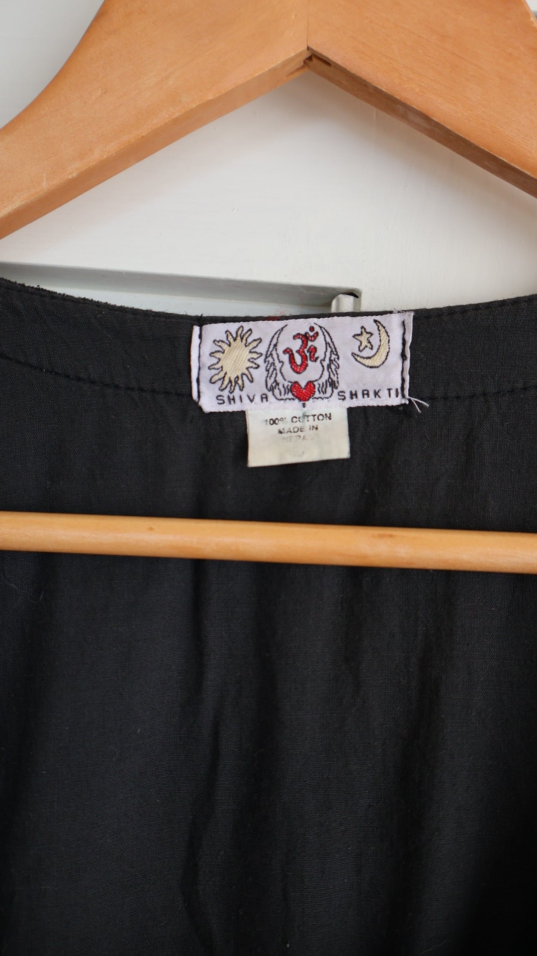 black velvet top braided embroidery and a laced-up bodice.