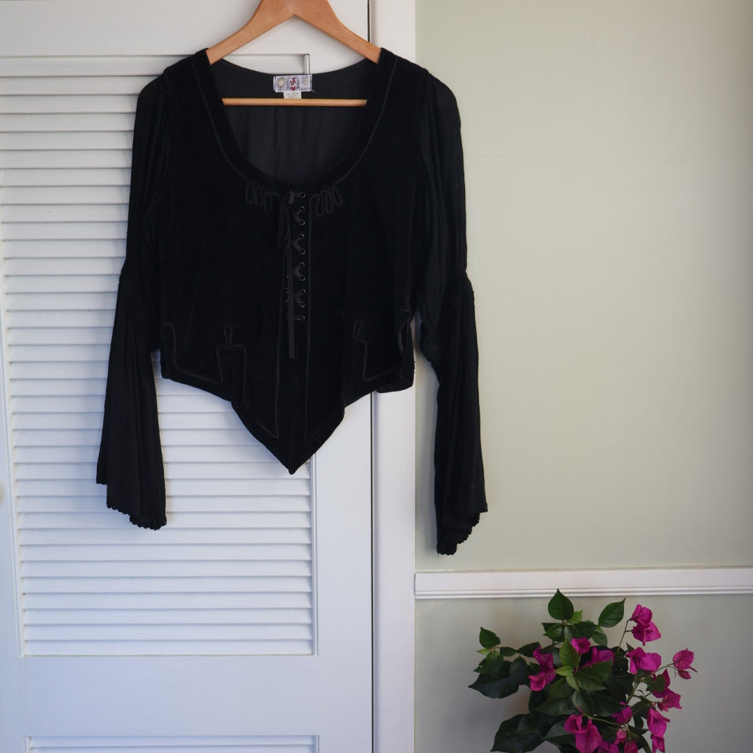 black velvet top braided embroidery and a laced-up bodice.